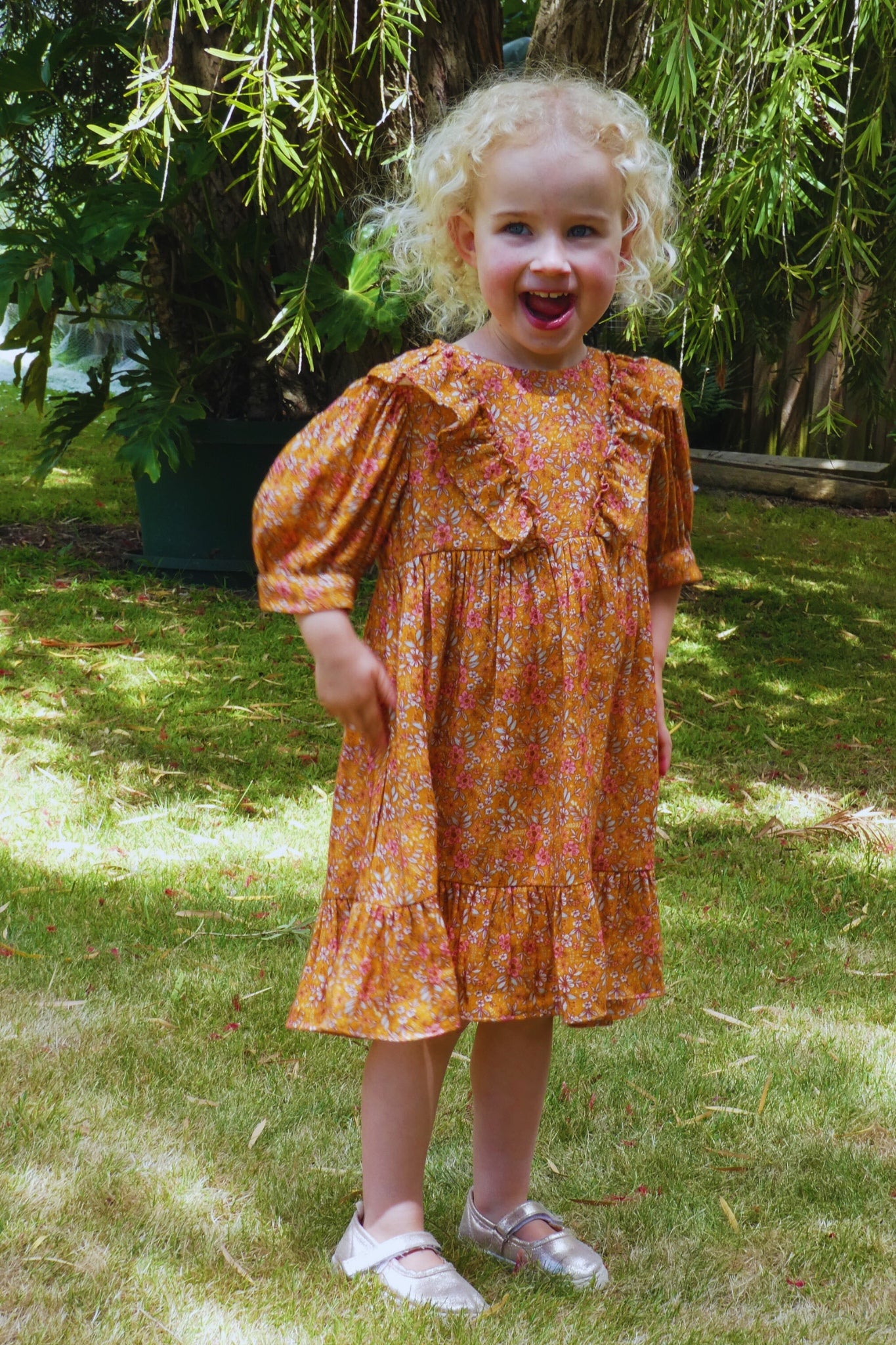 Child in Autumn Time mini me orange dress